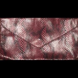 maroon snake skin clutch